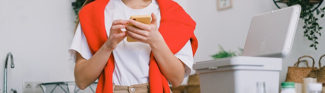 Woman thinking about donating her phone.