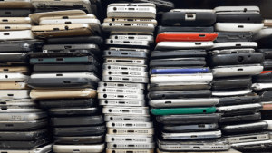 Large stack of recycled smartphones for charity