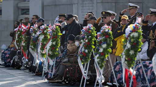 Visitors and veterans during a remembrance ceremony at Pearl Harbor